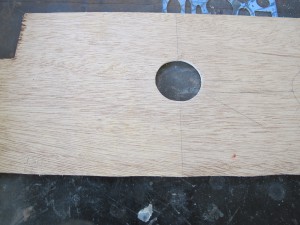 Ply Wood with hole cut into it, Just large enough for Quantum Tube to fit in