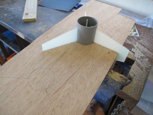 Cuts made in Ply wood at 120 degrees allow correct positioning of fins in Quantum Tubing.