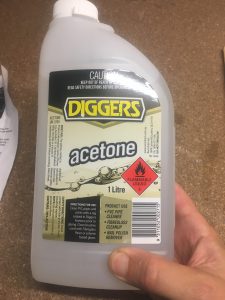 Acetone used to clean internal thread of retainer